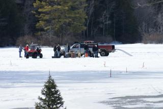 Residents ice-fishing on Freeses Pond, PHOTO CREDIT: David Linden